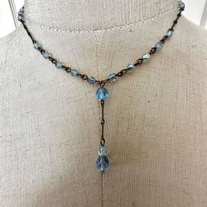 Silver/   gold tone and blue Y necklace